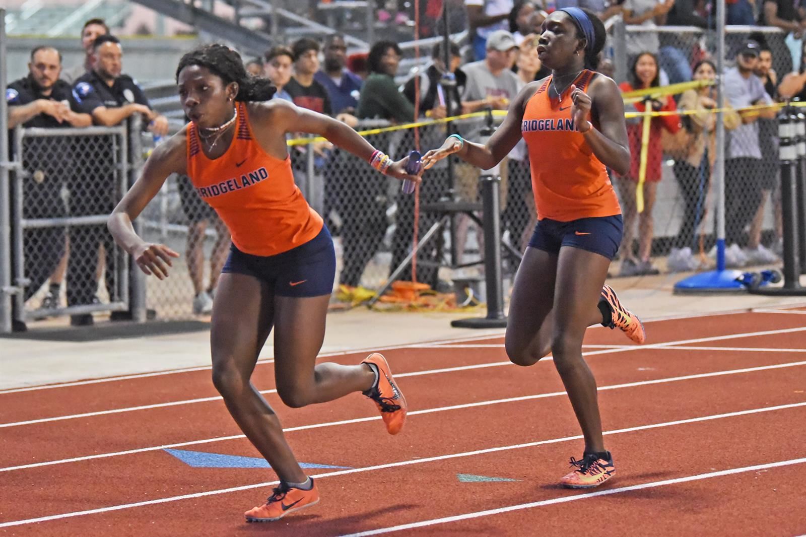 Bridgeland High School senior Cameilla Huggins, right, and Rosa Huggins helped the 4x400-meter relay team qualify for state.